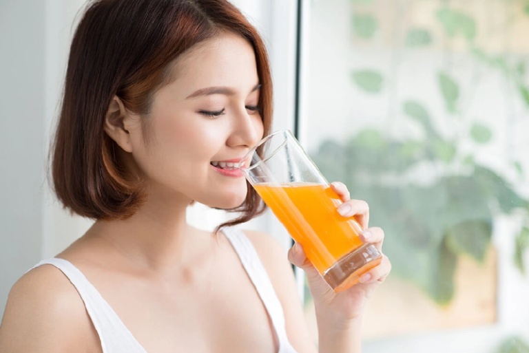 Nâng mũi xong uống nước cam được không